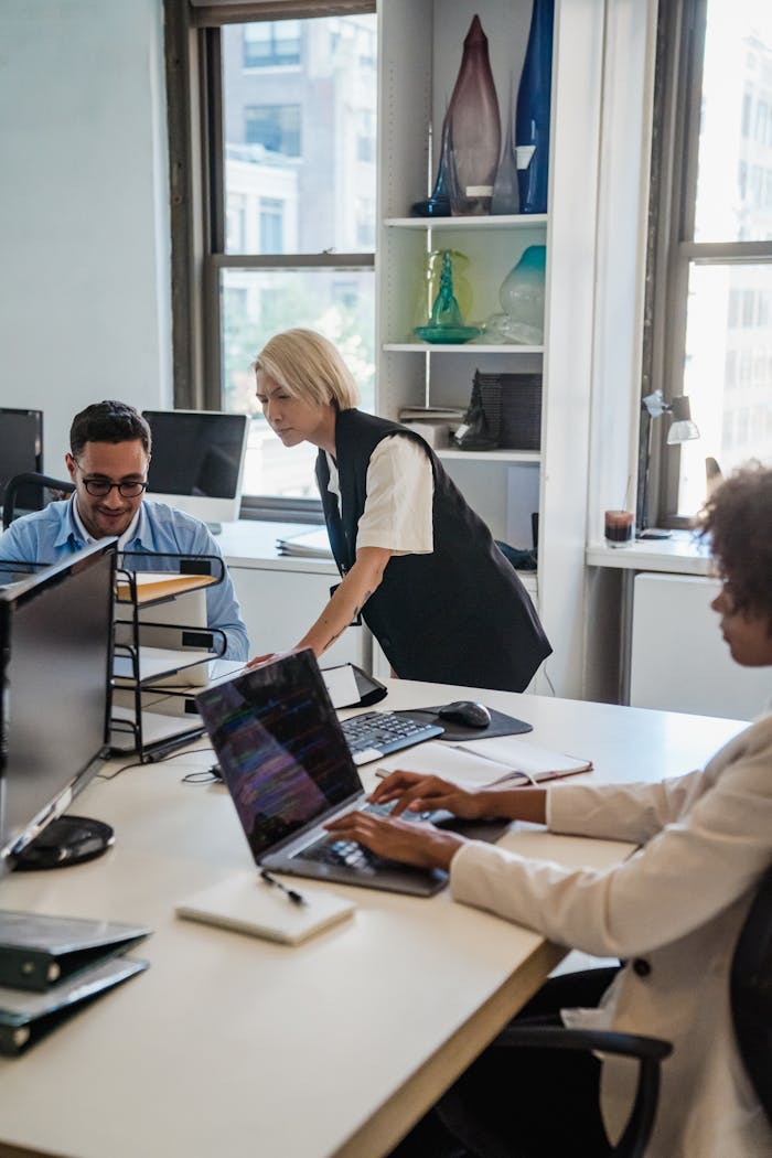 People Working Together in Office